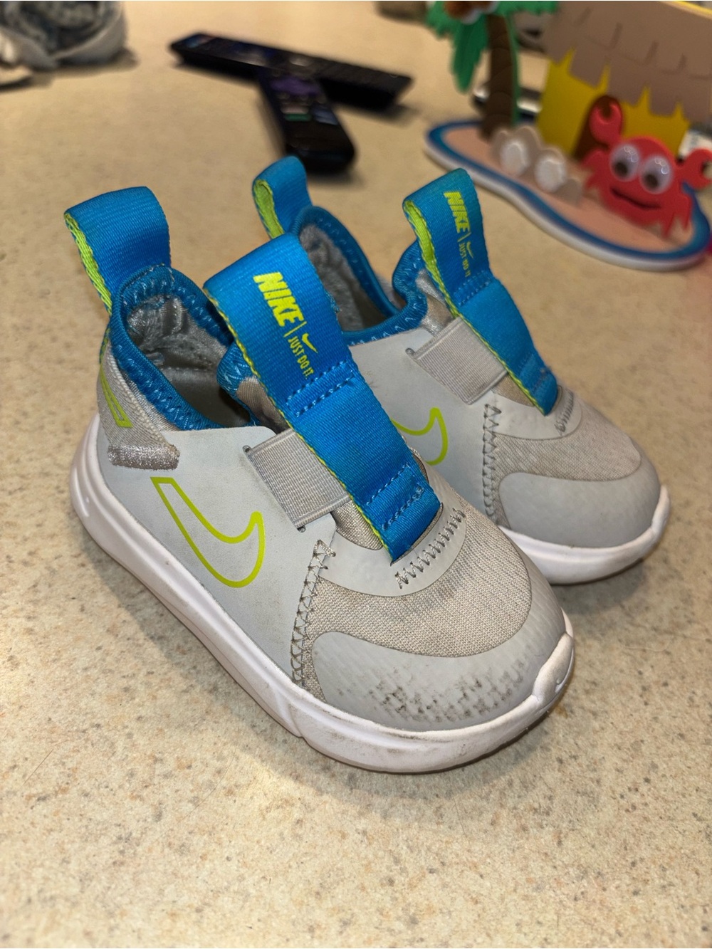 Nike Kids Slip-On Sneakers in Light Gray, Blue and Neon Yellow